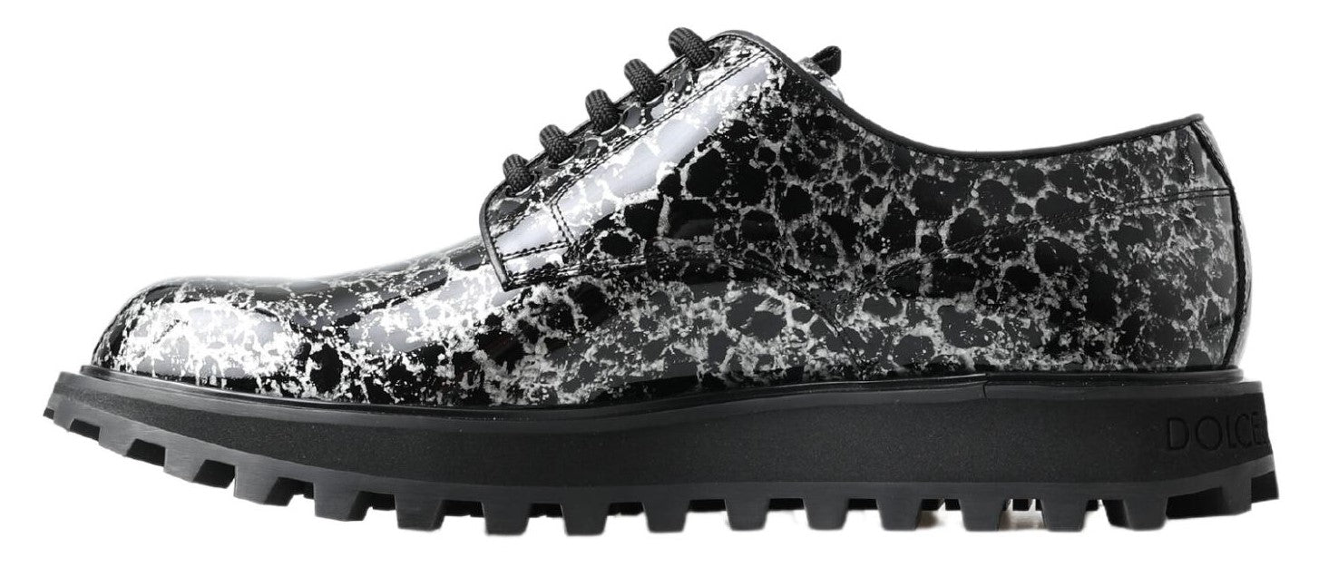 Black and white shoe with a patterned design on the upper