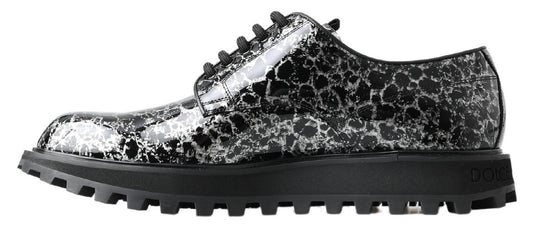 Black and white shoe with a patterned design on the upper