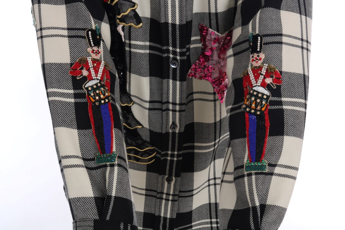 Pair of plaid pants with embroidered soldier figures on front