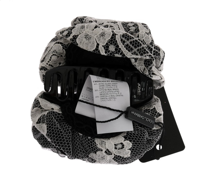 Black lace scarf with white tag attached to it
