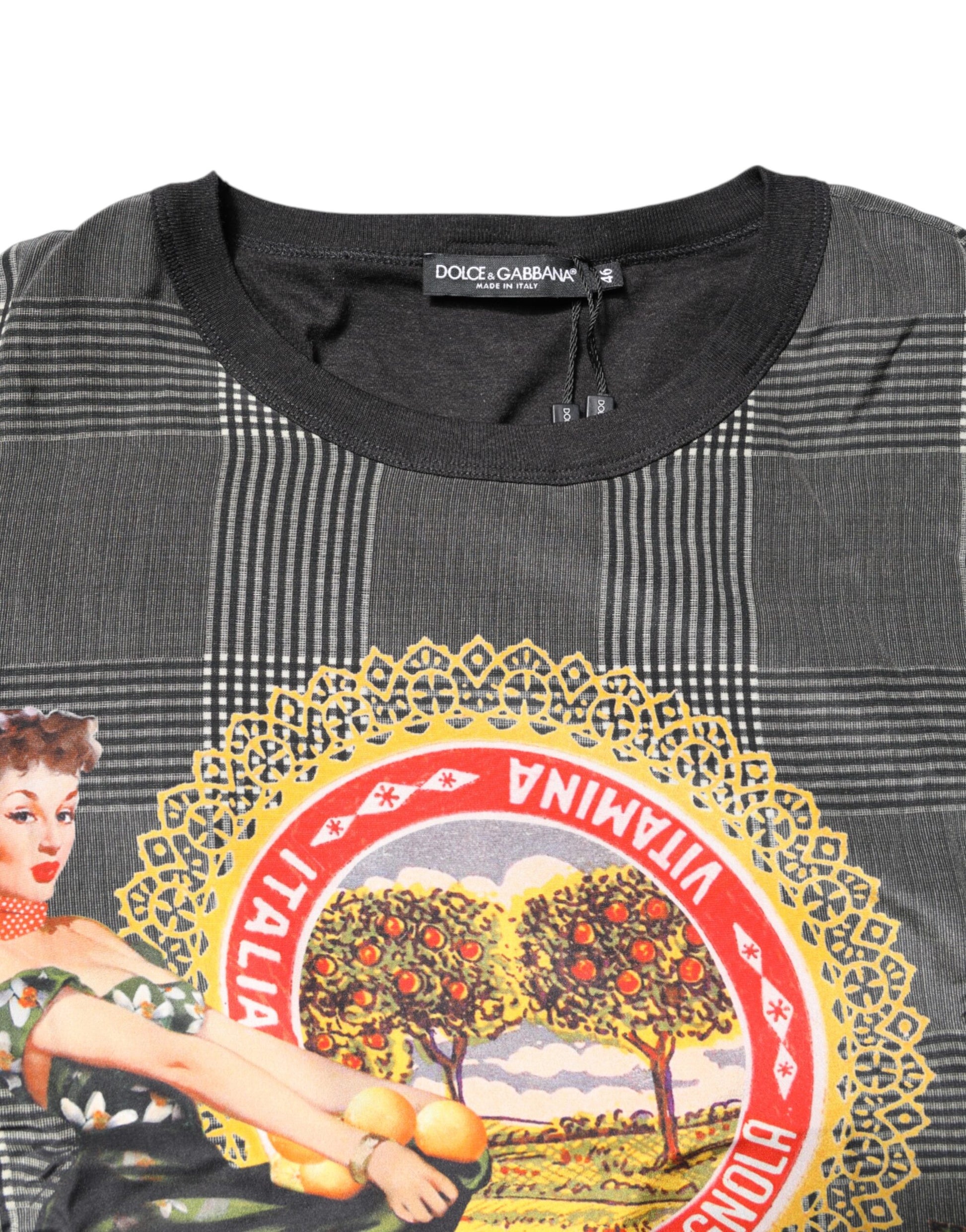 Black t-shirt with a graphic design featuring a woman holding fruit