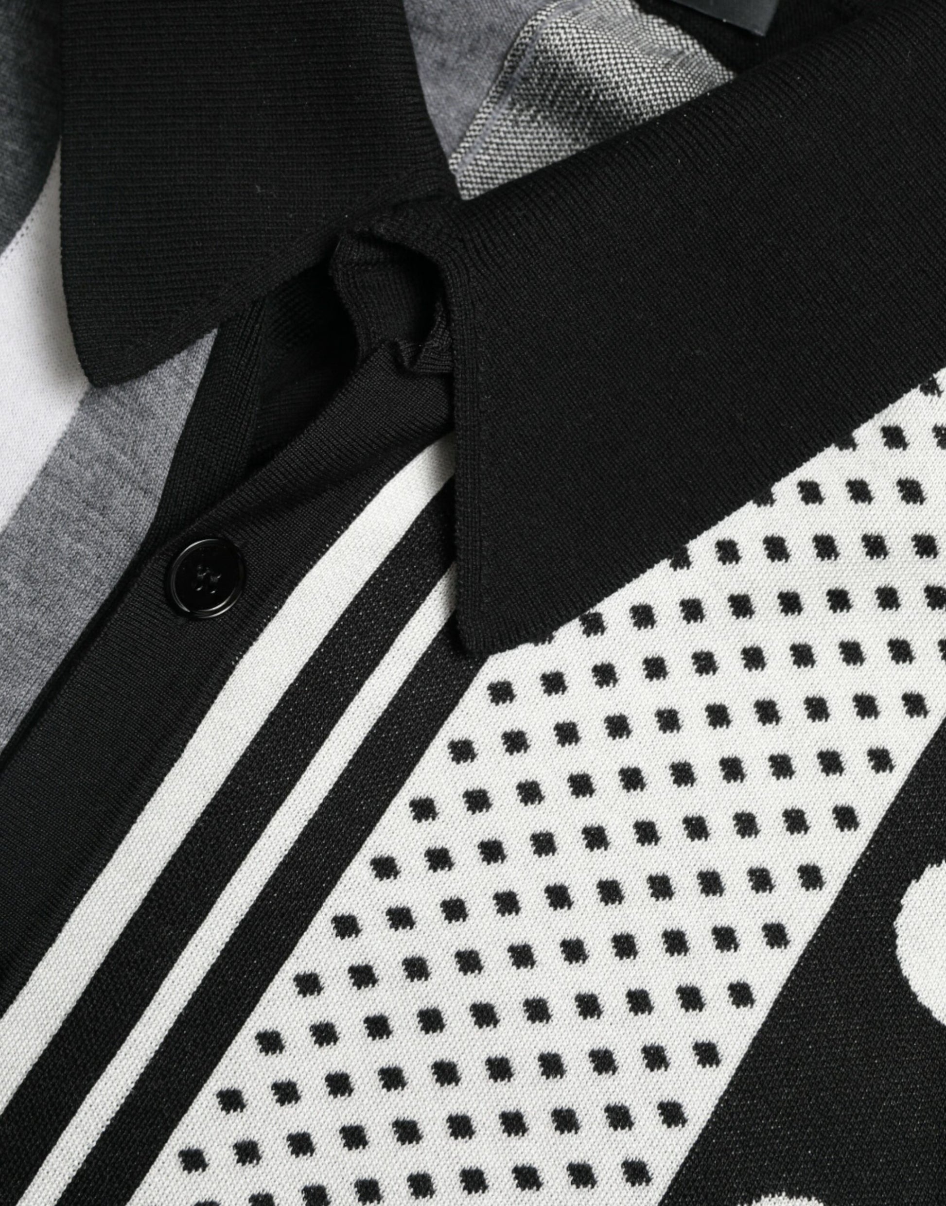 Black polo shirt with white stripes and patterned sleeves