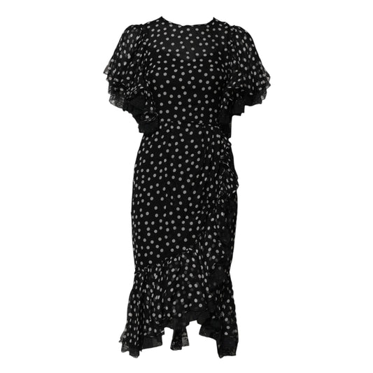 A black chiffon dress with white polka dots and lace detailing
