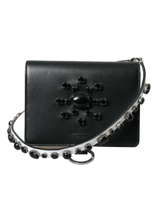 Black leather purse with silver accents and beaded straps