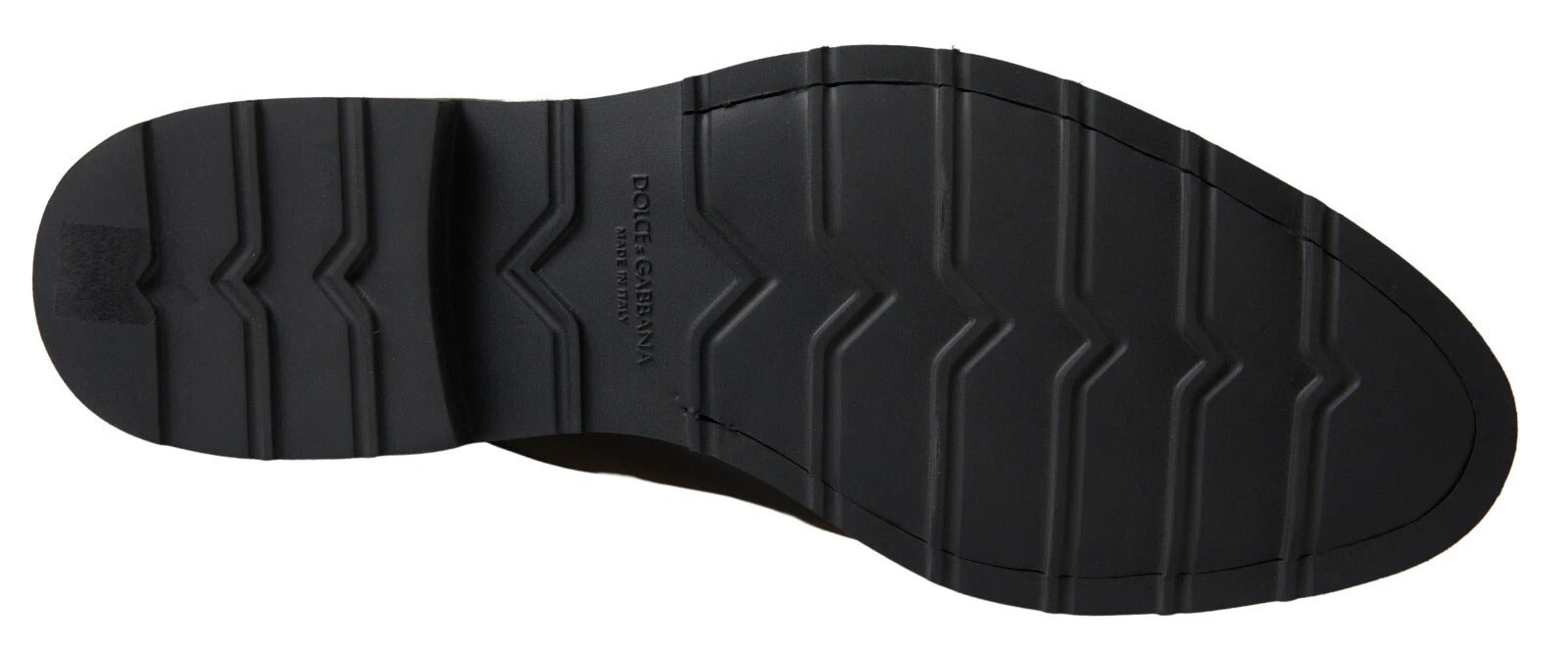A pair of black and white leather formal dress shoes by Dolce & Gabbana