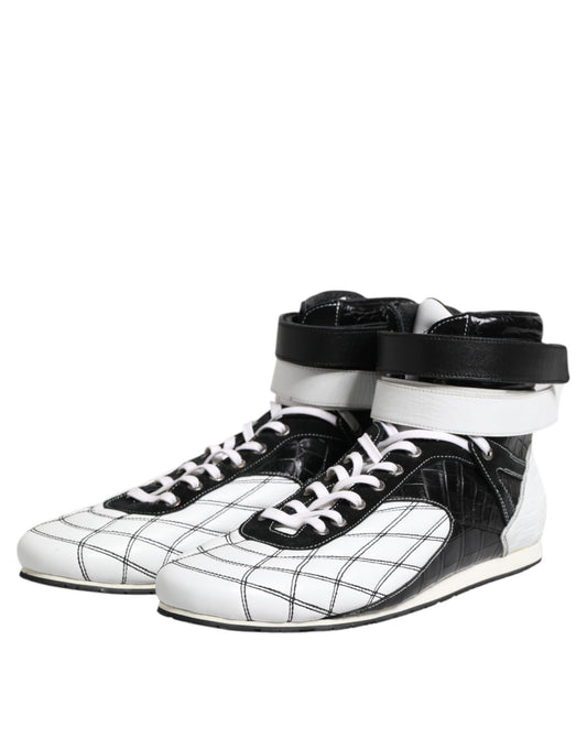 Pair of black and white sneakers with laces
