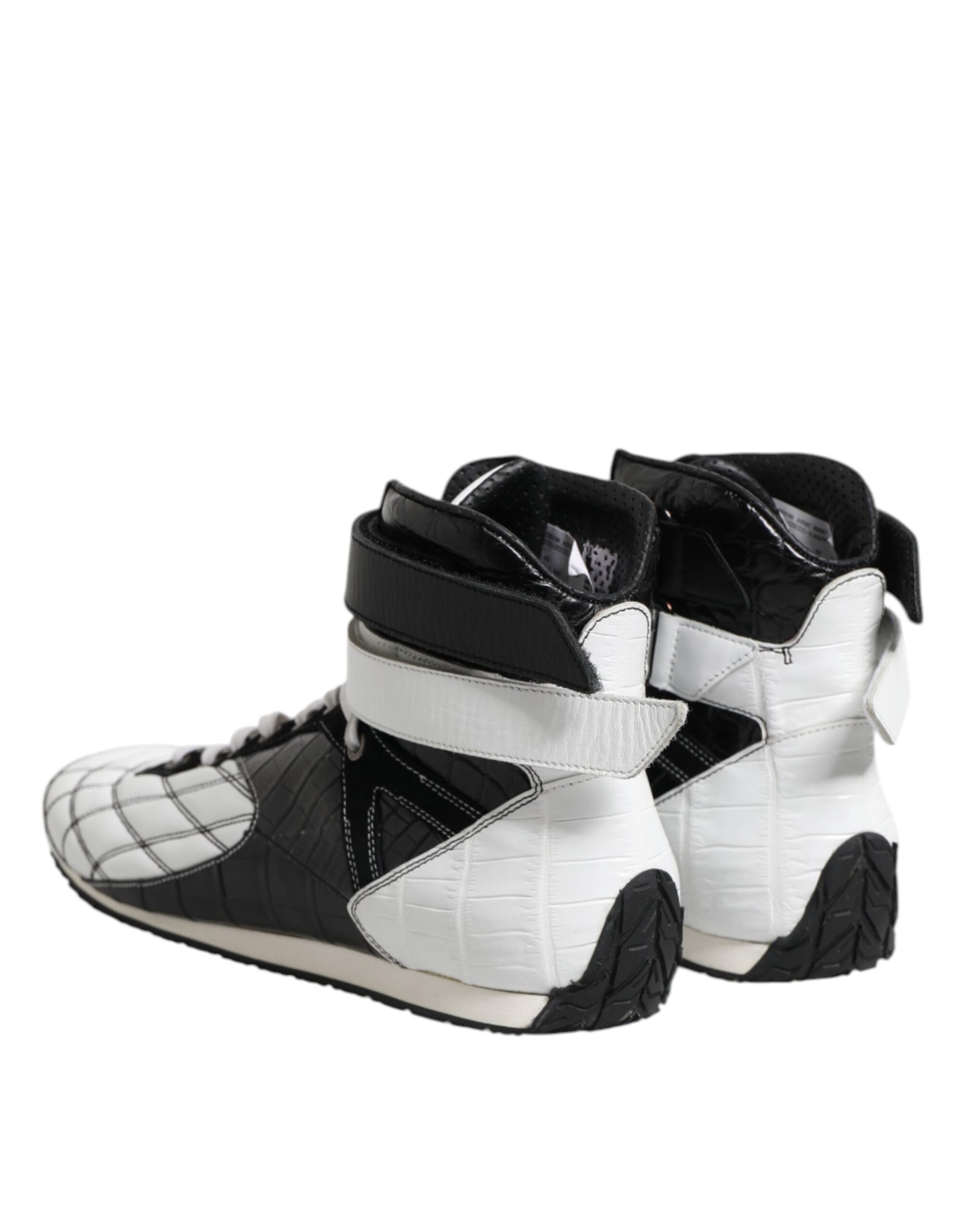 Pair of black and white sneakers with laces