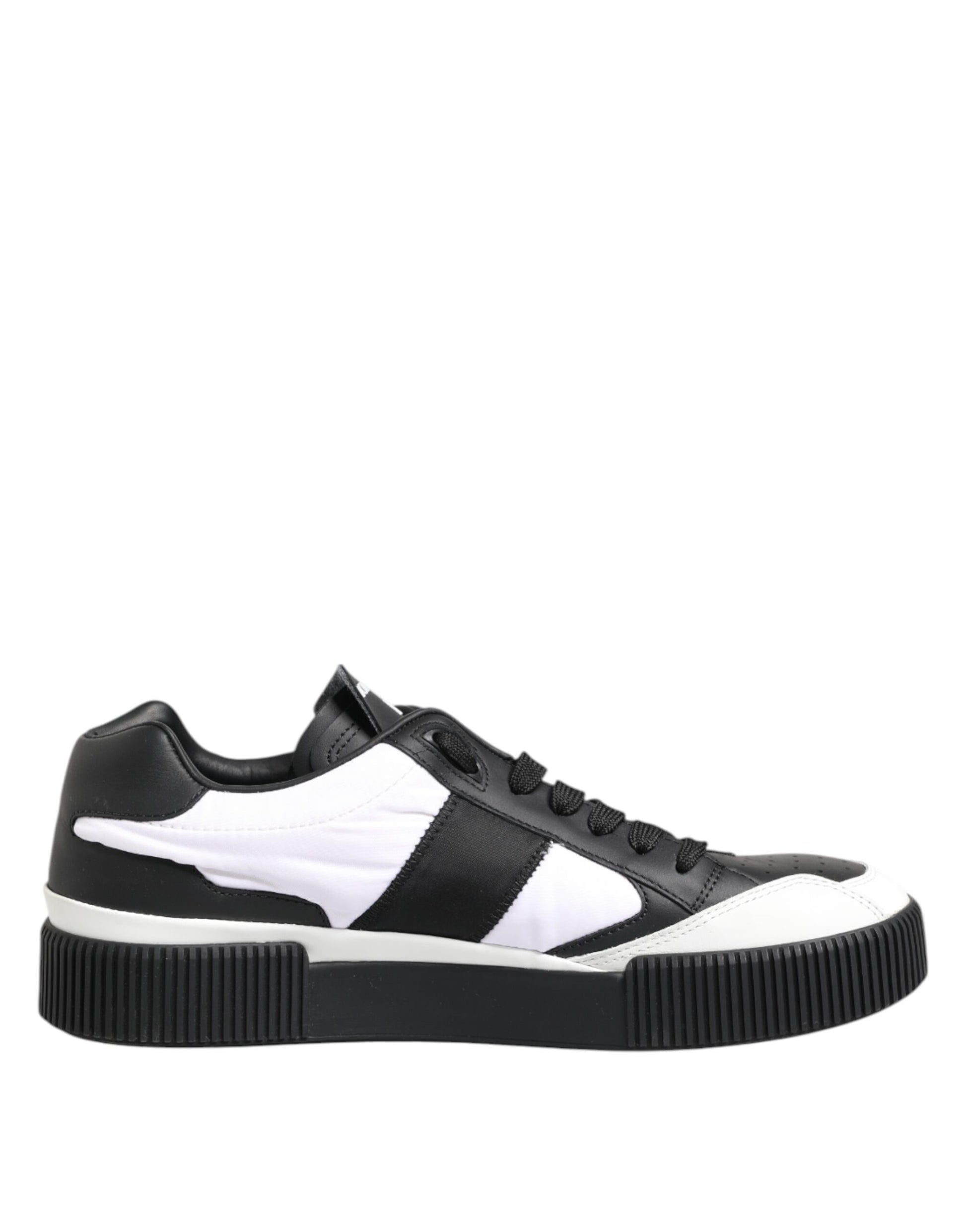 Black and white leather sneakers with laces, featuring a low top design