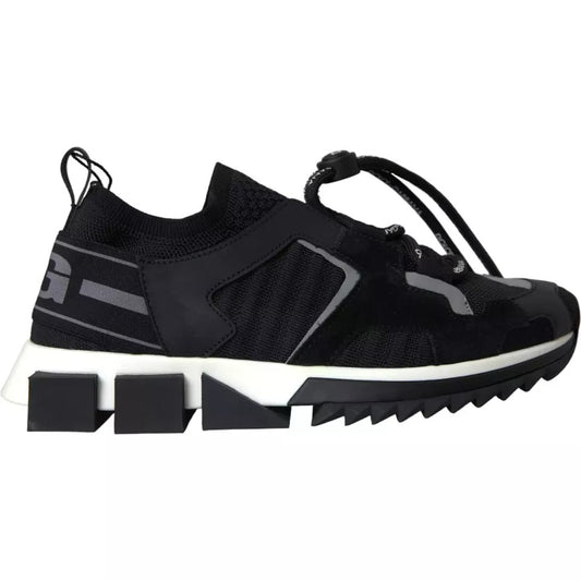 A pair of black and white sneakers with a logo on the side, designed for men