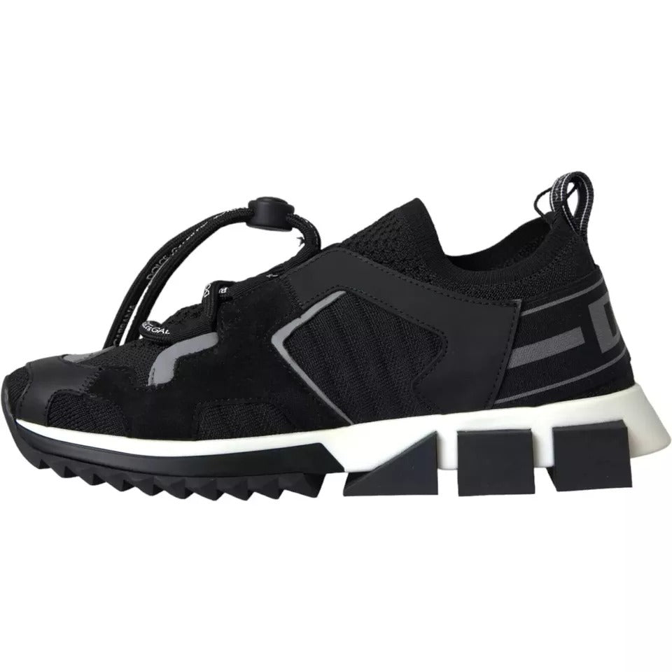 Black and white sneakers with logo on side