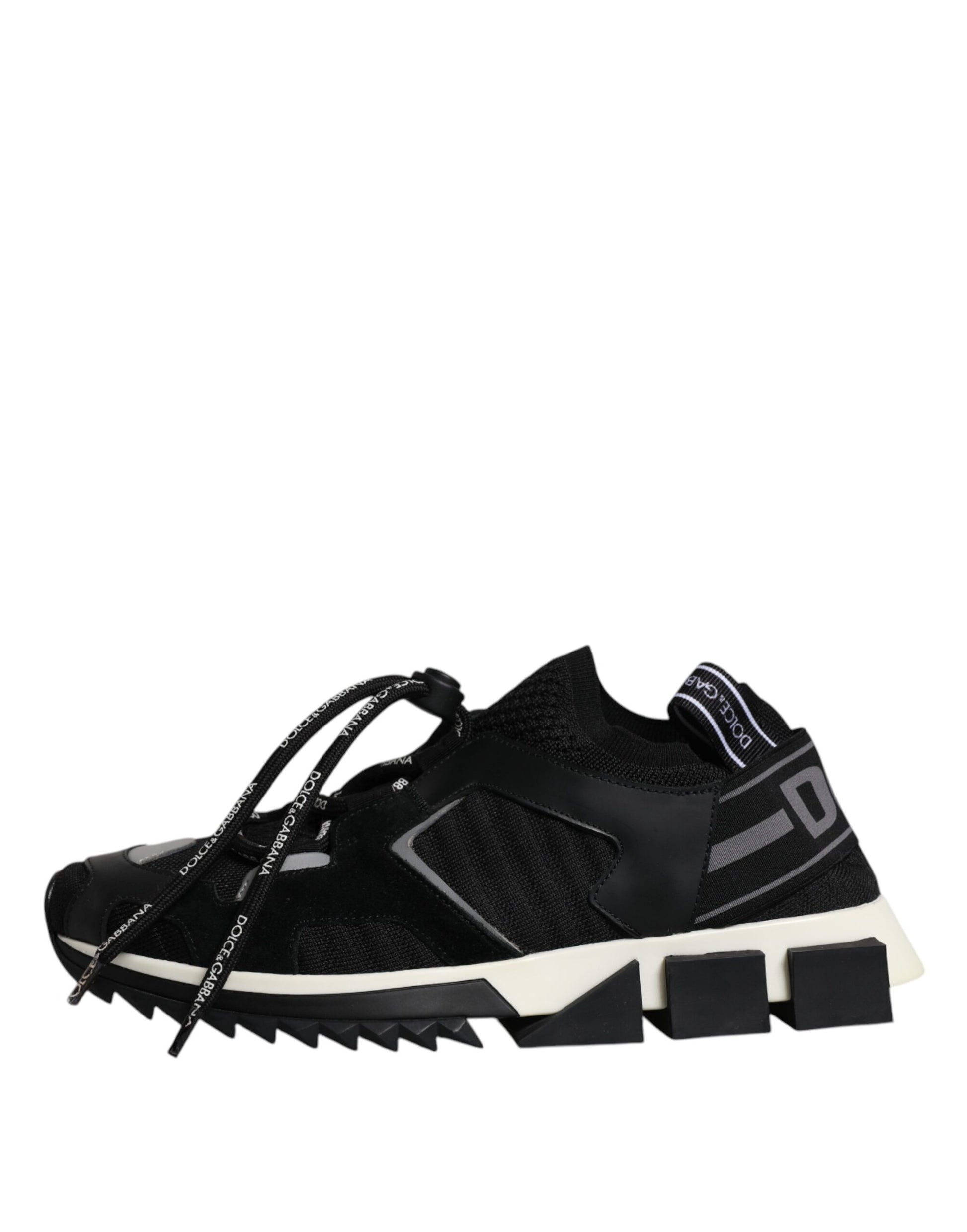 Black and white athletic shoe with laces and a strap across the top