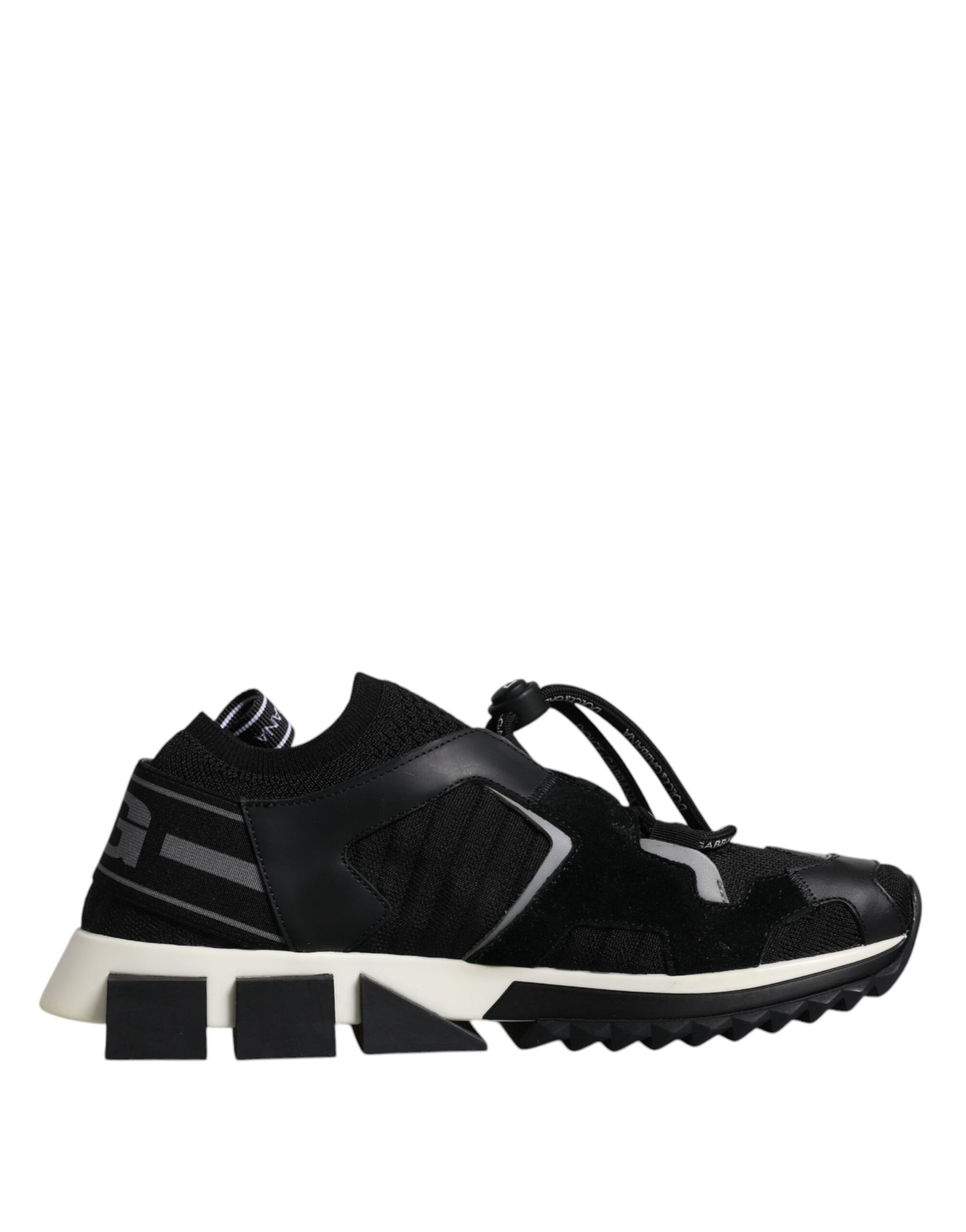 Black and white athletic shoe with laces and a strap across the top