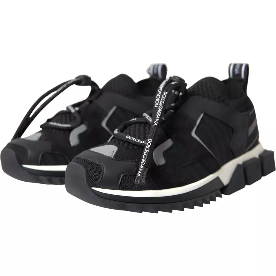Pair of black and white sneakers with logo detailing, designed for men