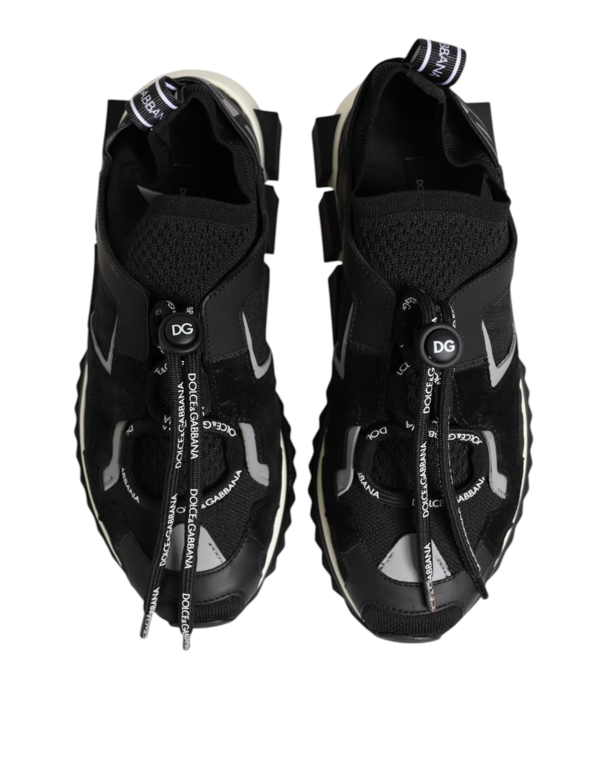 Pair of black sneakers with white laces and a logo on the side