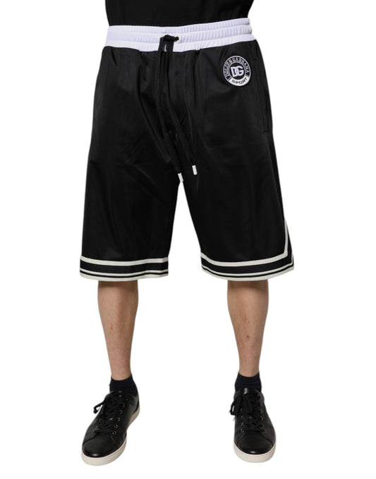 A pair of black and white men's bermuda shorts