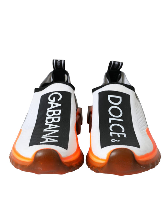 Pair of sneakers with brand names on side