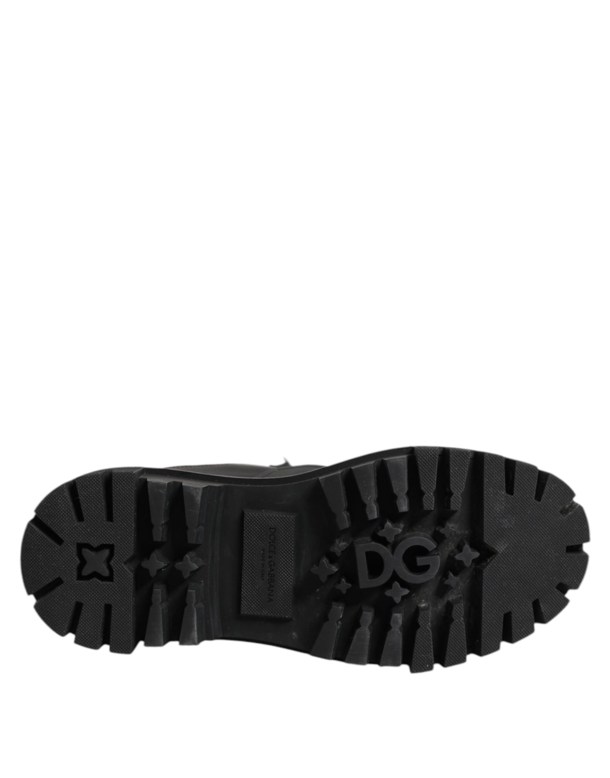 Black rubber boot with treads for outdoor wear
