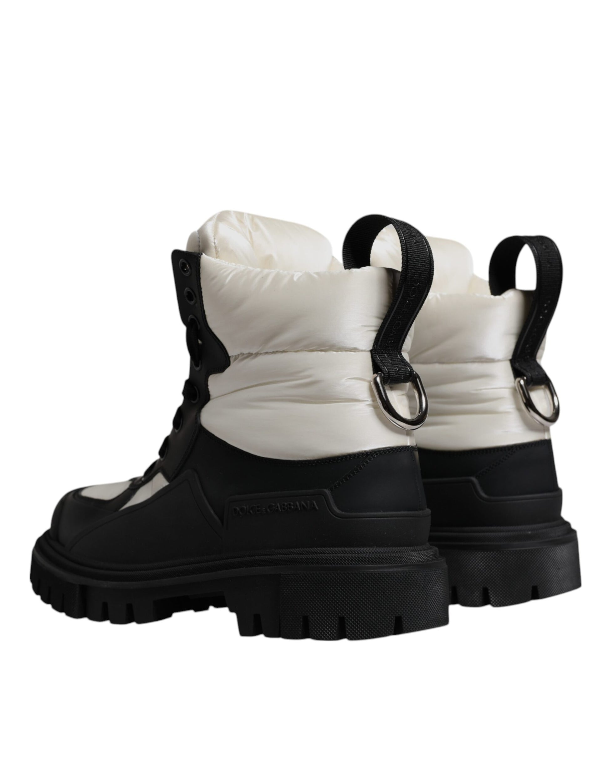 Pair of black snow boots with white trim