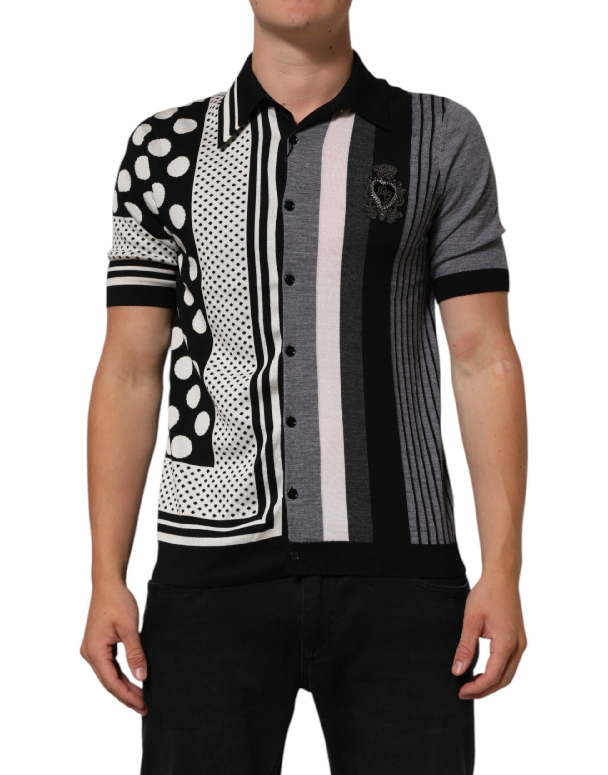 Man wearing a checkered shirt with black, white, gray, and pink stripes