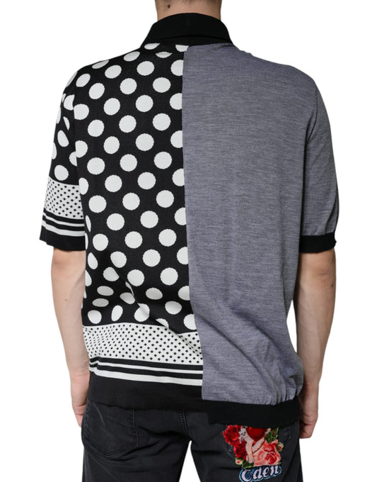 Man wearing a polka dot shirt over a gray sweater vest