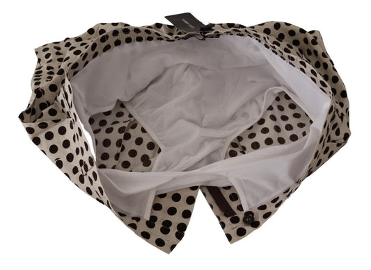 Open polka dot bag with white interior