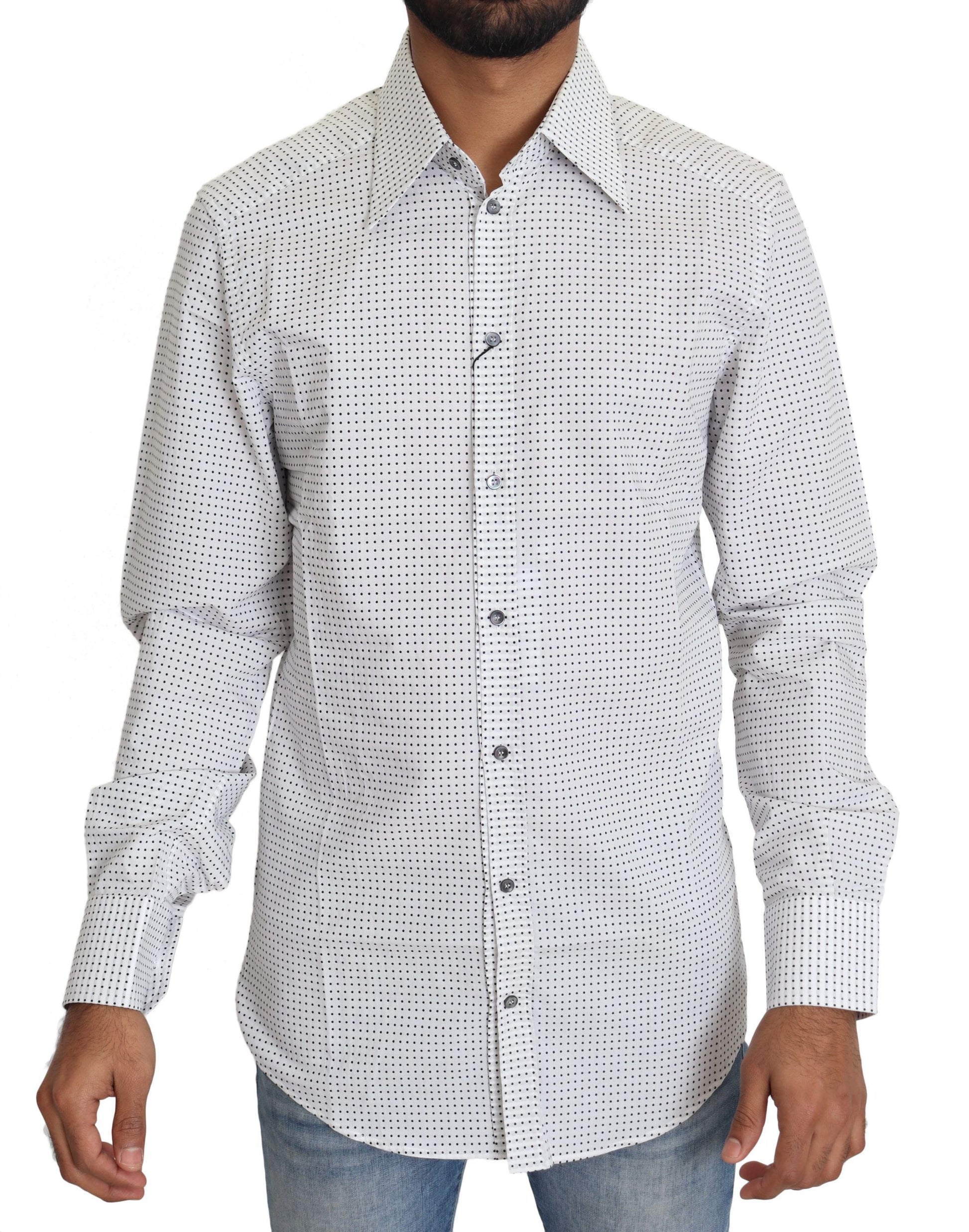 Man wearing long sleeve shirt with polka dots