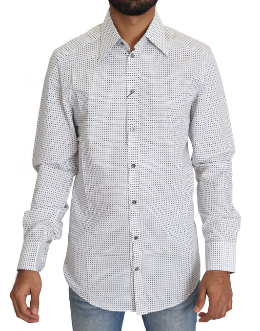 Man wearing long sleeve shirt with polka dots