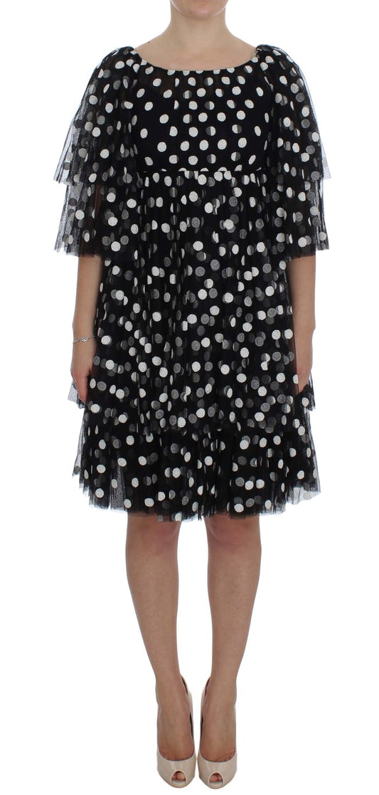 Black dress with white polka dots
