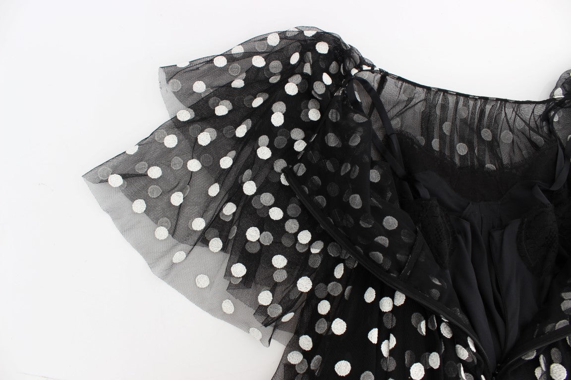 Black dress with white polka dots