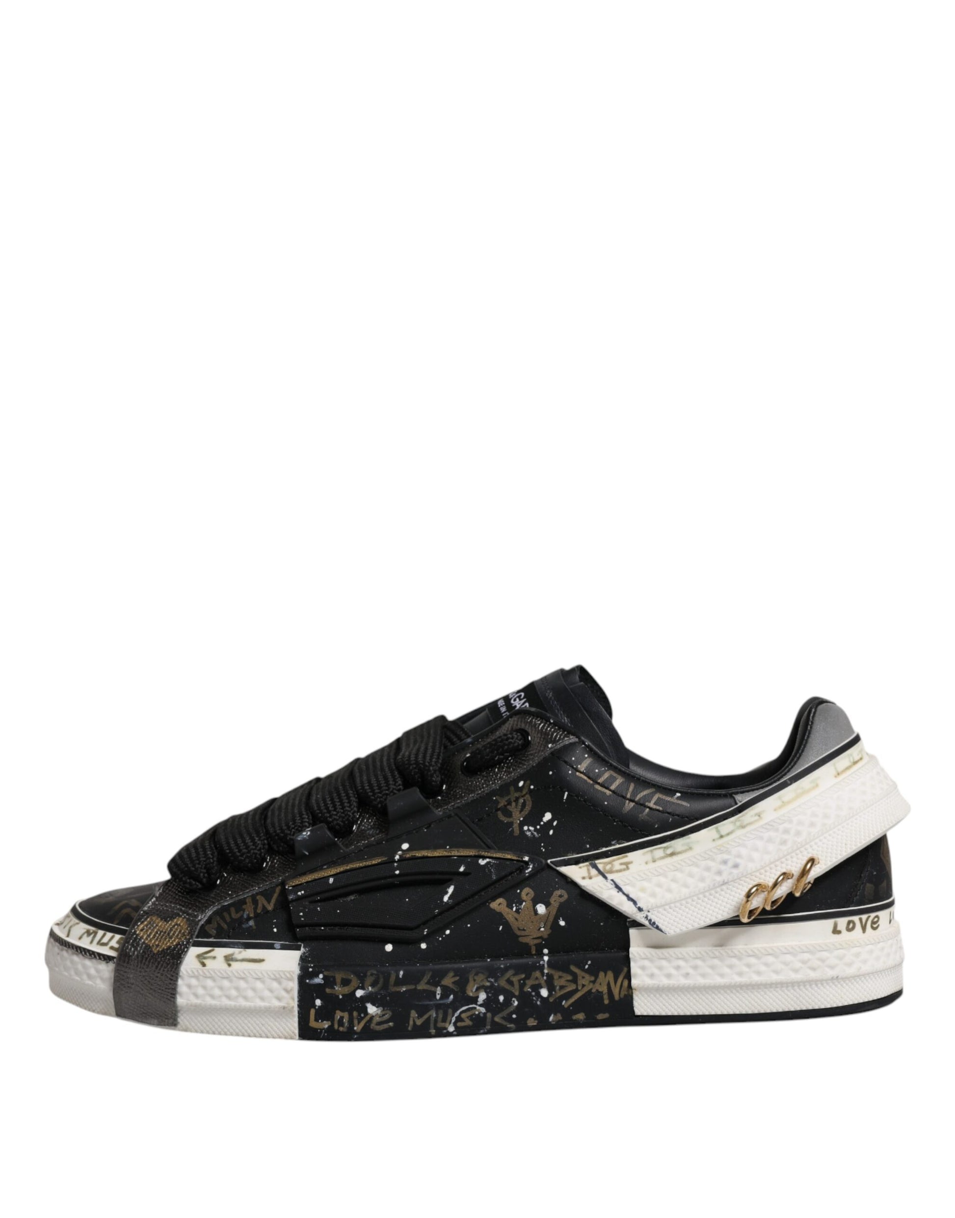 A pair of black and white sneakers with a patterned design on the side, featuring the Dolce & Gabbana logo