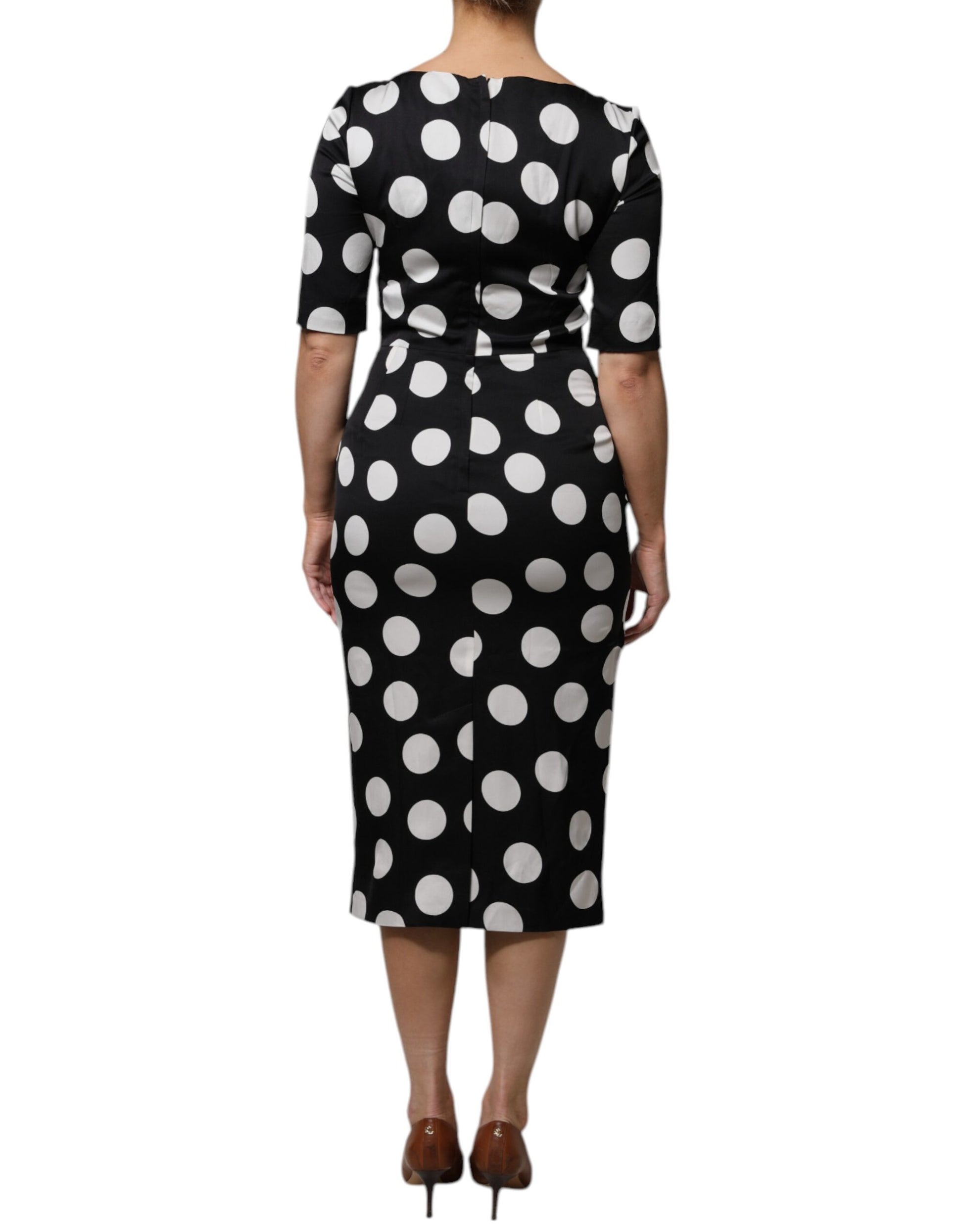 A black and white polka dot sheath midi dress from Dolce & Gabbana
