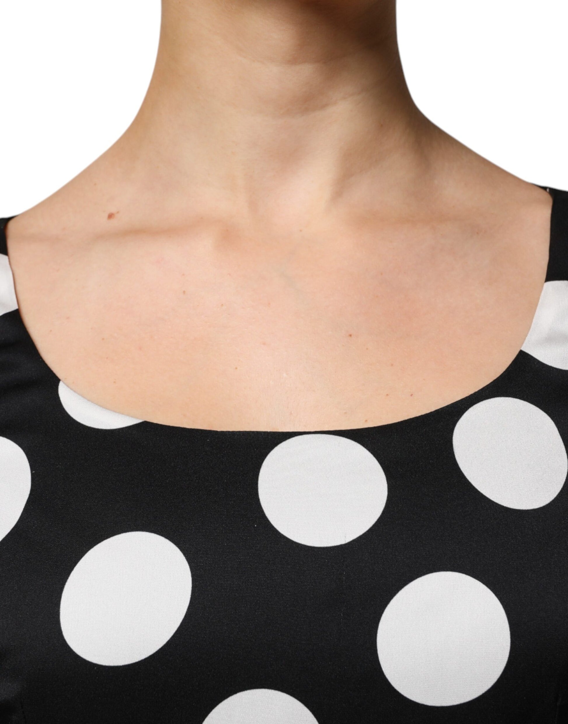 A black and white polka dot sheath midi dress from Dolce & Gabbana