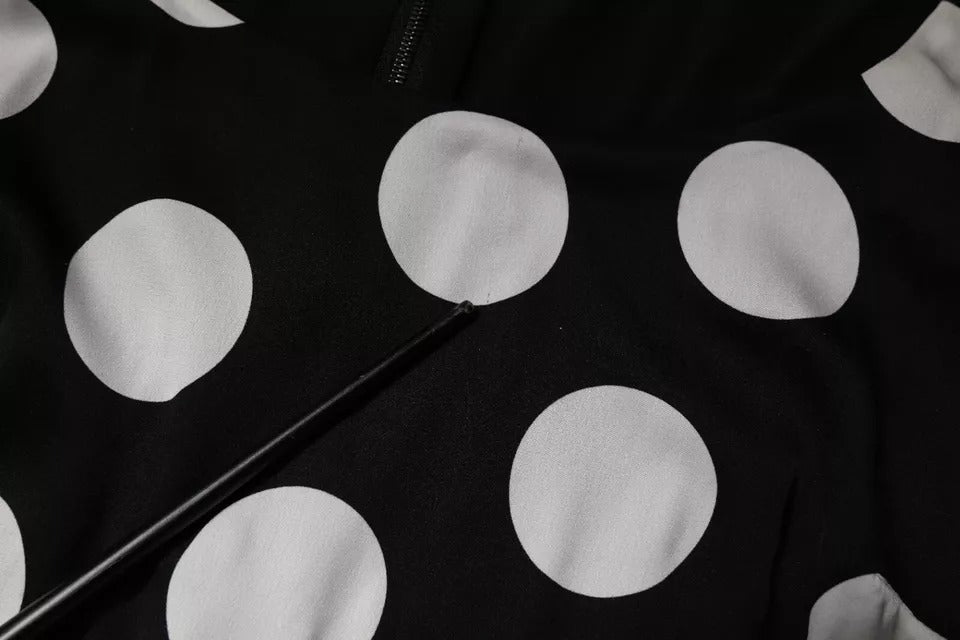 A black and white polka dot sheath midi dress from Dolce & Gabbana