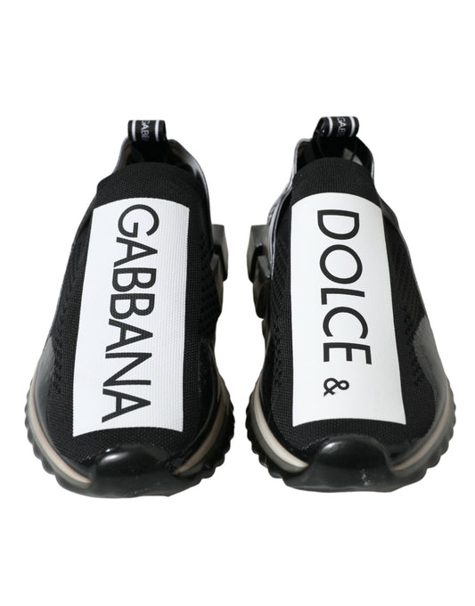 Pair of black and white sneakers with brand names on side