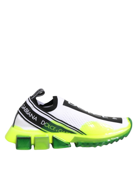 Yellow and black slip on shoes with white soles, featuring the Dolce & Gabbana logo