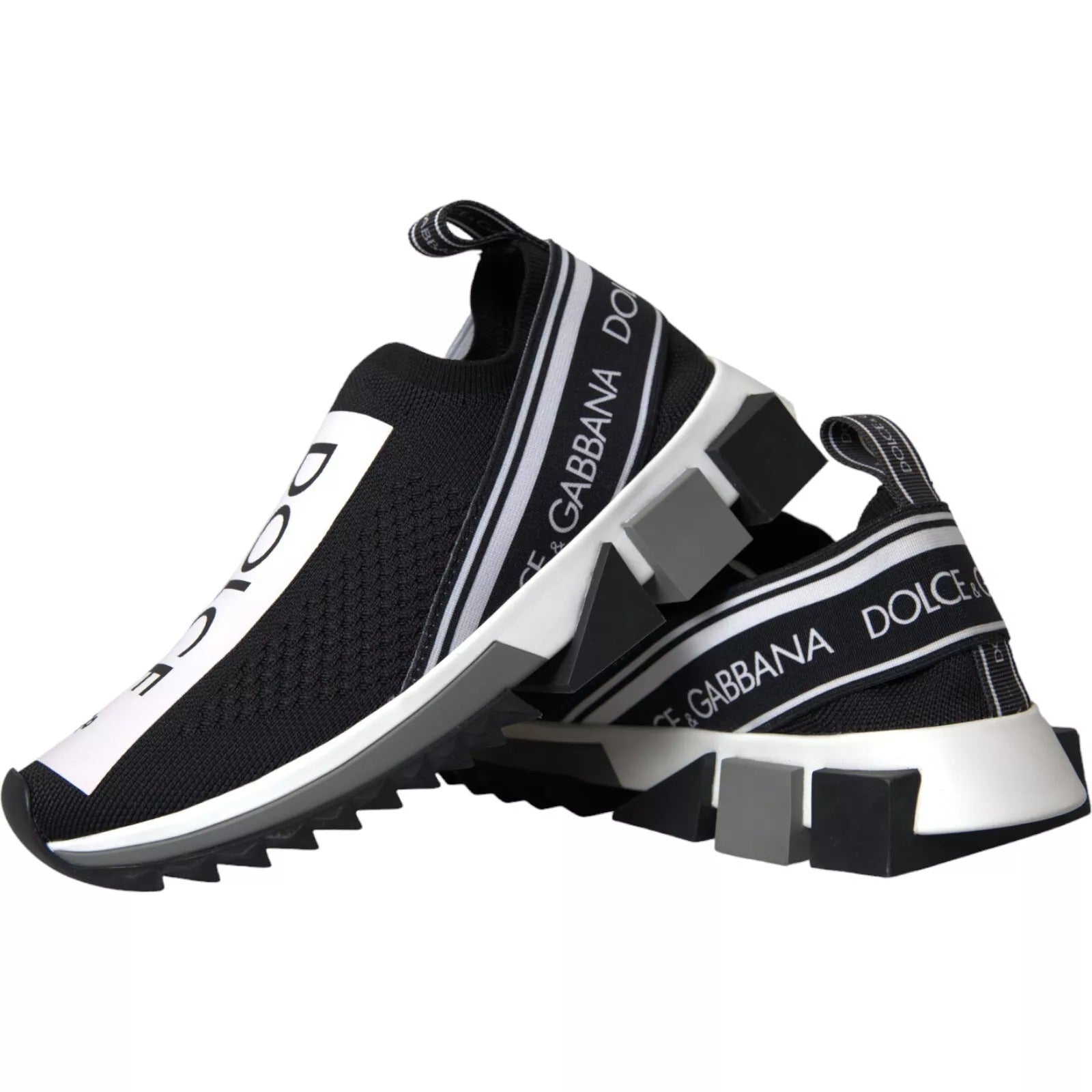Black sneaker with white stripes and brand name on side