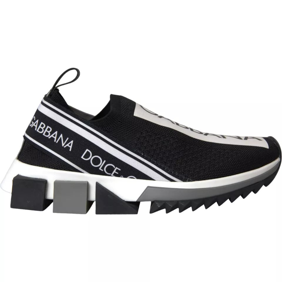 Black and white slip on shoes with brand name on side