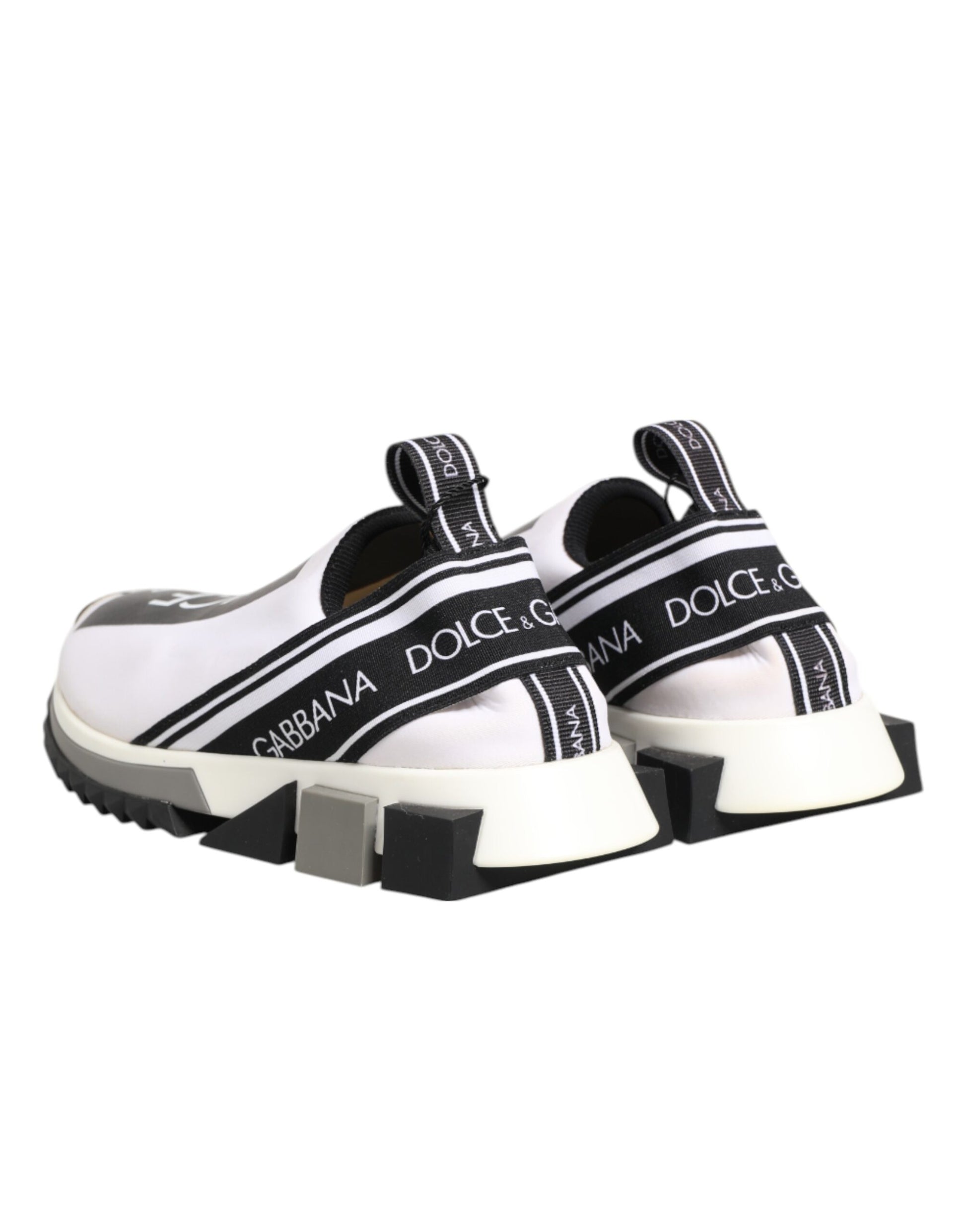 Pair of black and white slip-on shoes with Dolce & Gabbana logo