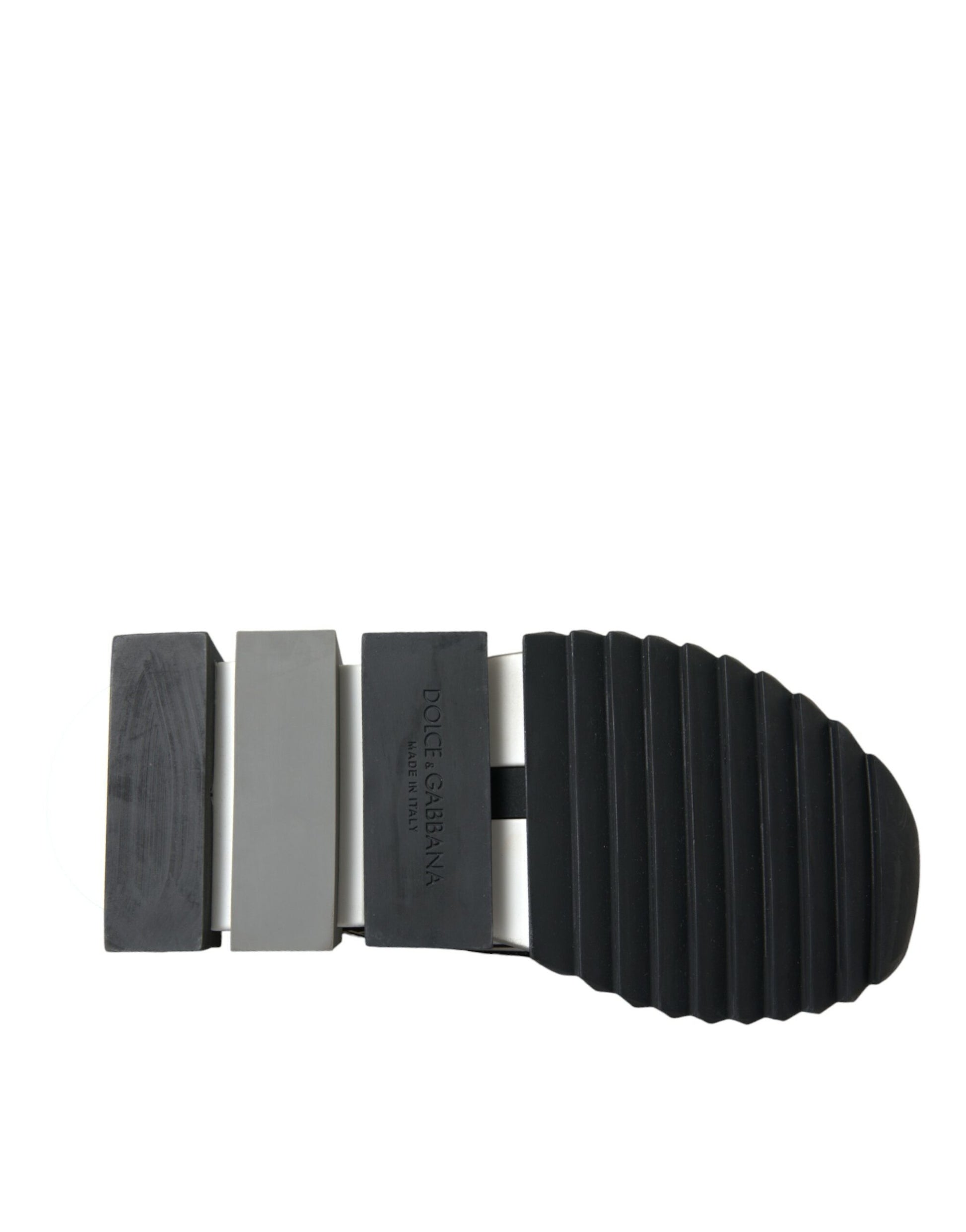 Black shoe sole with multiple layers of rubber