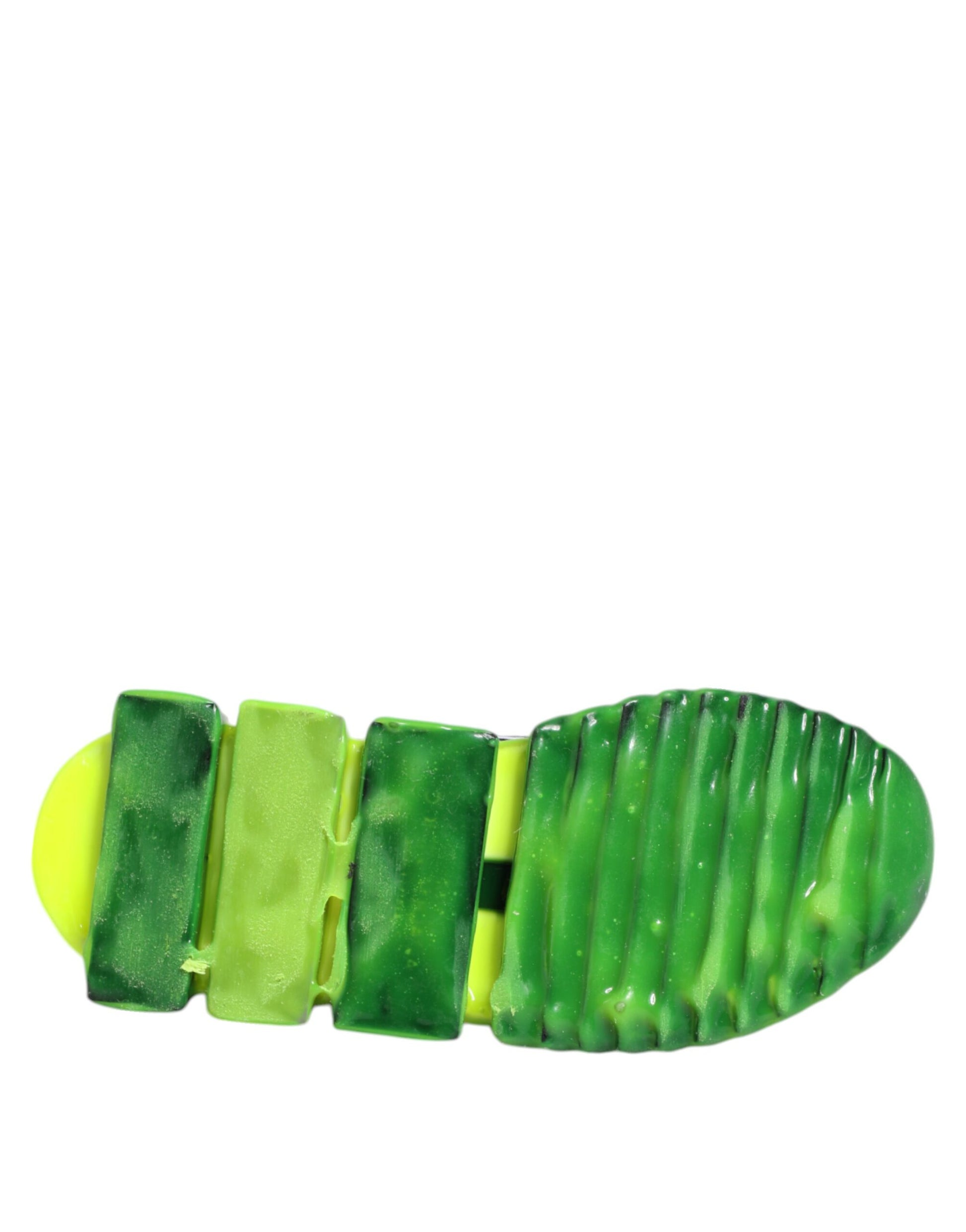 Green and yellow slip on shoes with black laces
