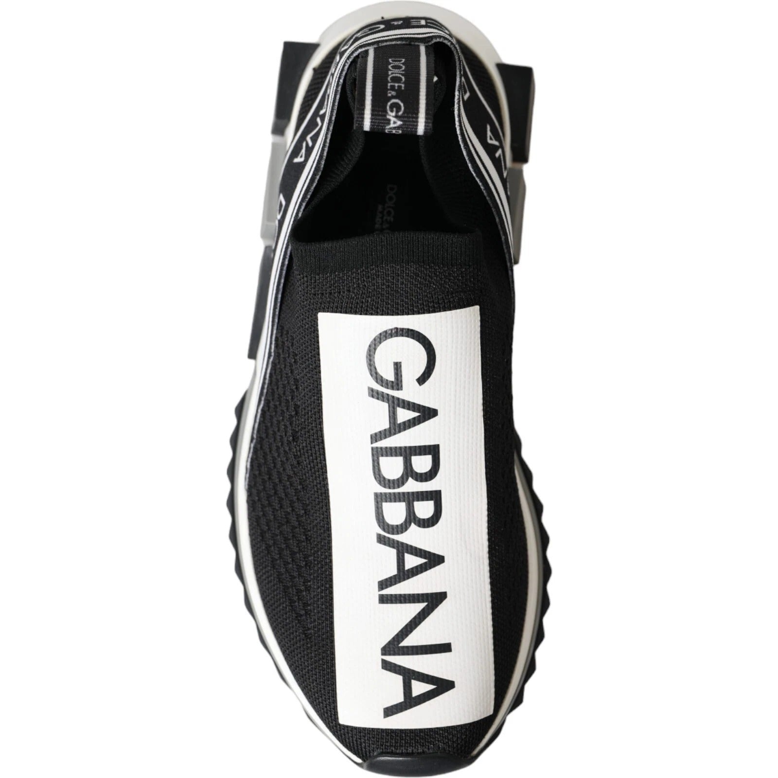 Black sneaker with white sole and logo