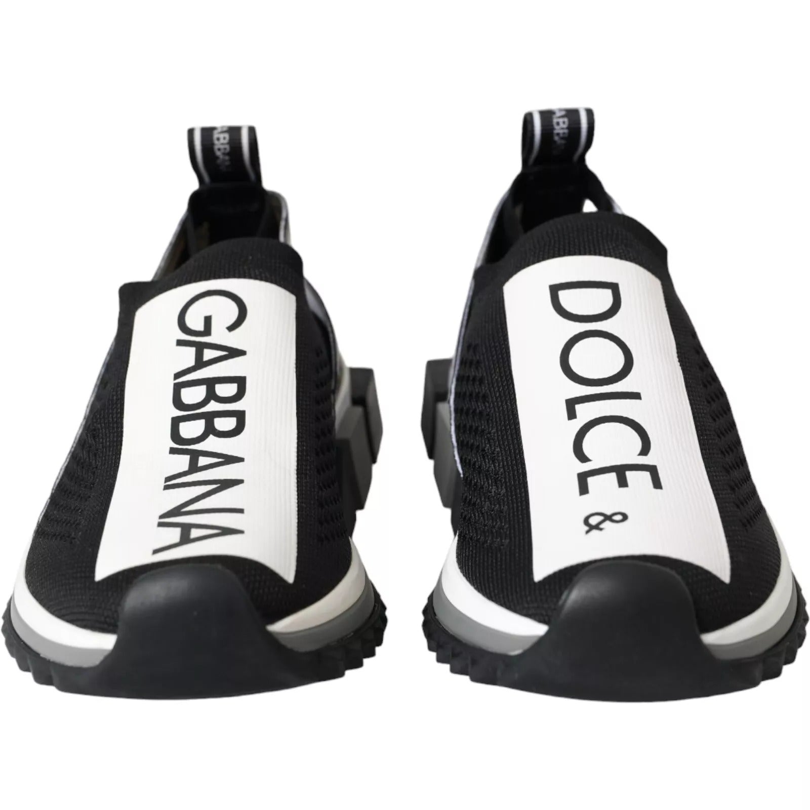 Black and white sneakers with brand names on side