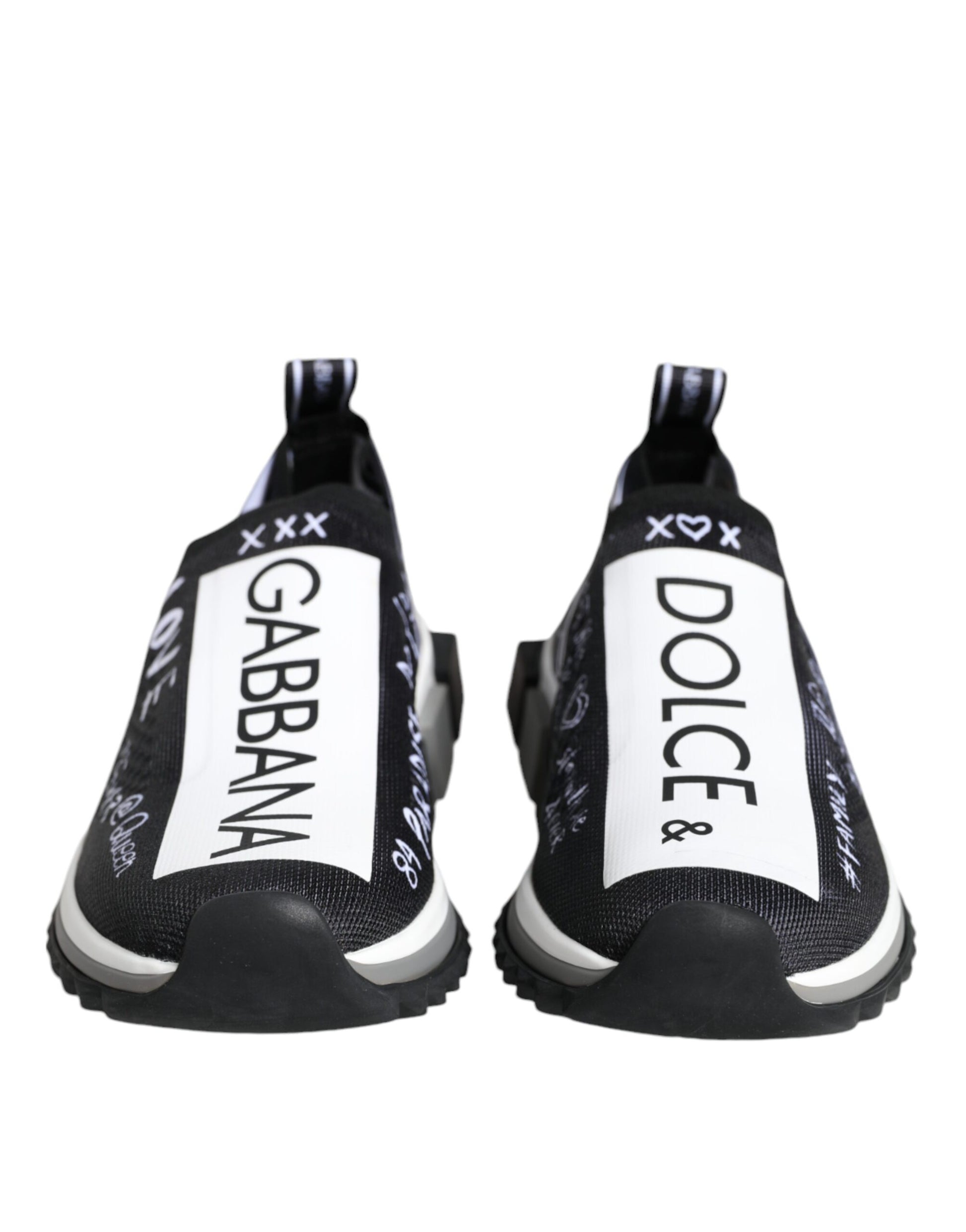 Pair of black and white sneakers with brand names on side