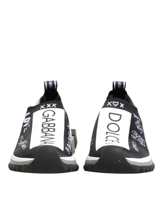 Pair of black and white sneakers with multiple signatures on side panels