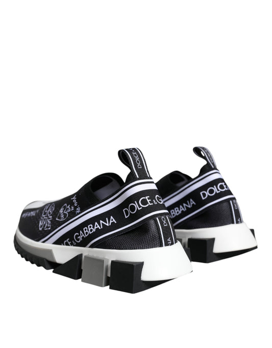 Pair of black and white sneakers with brand name on side