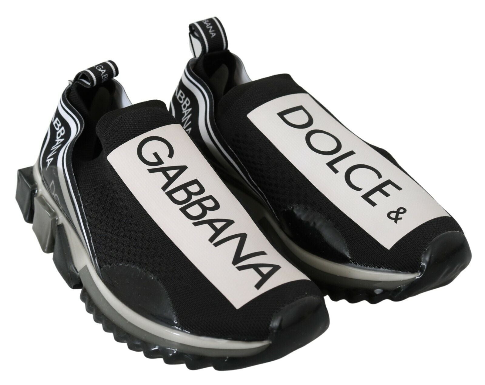 Black and white sneakers with brand names on side