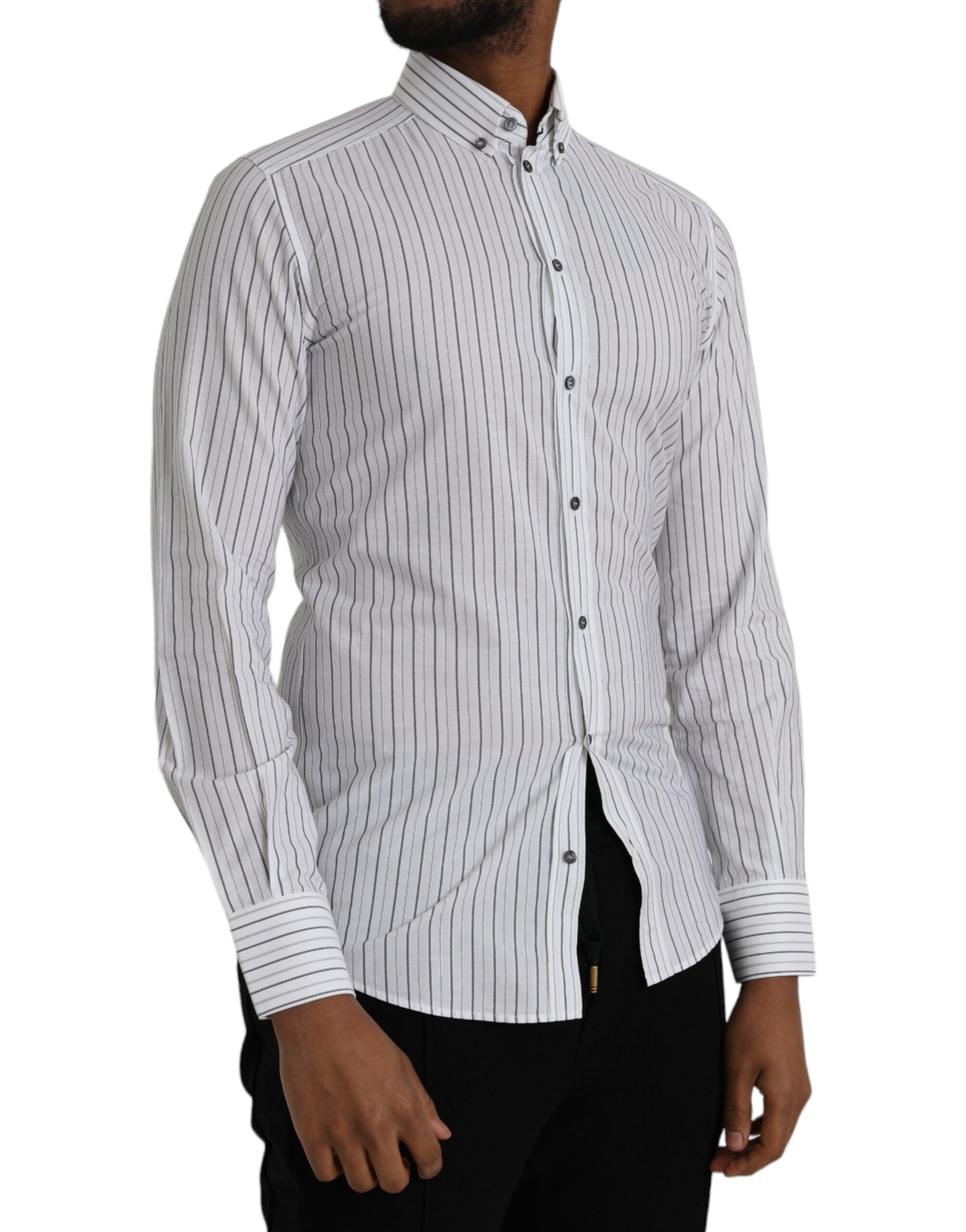 A black and white striped shirt with gold buttons