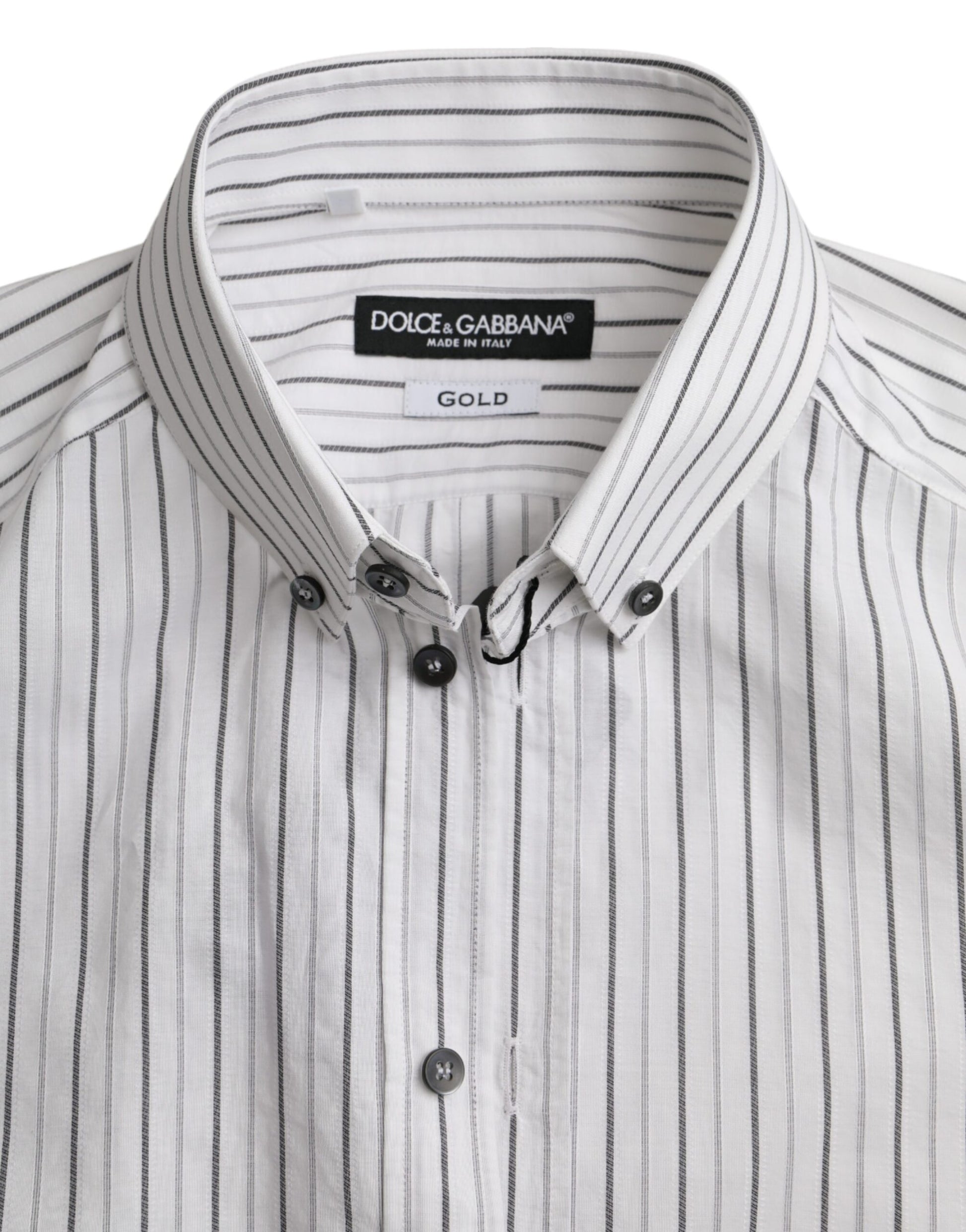A black and white striped shirt with a gold label from Dolce & Gabbana