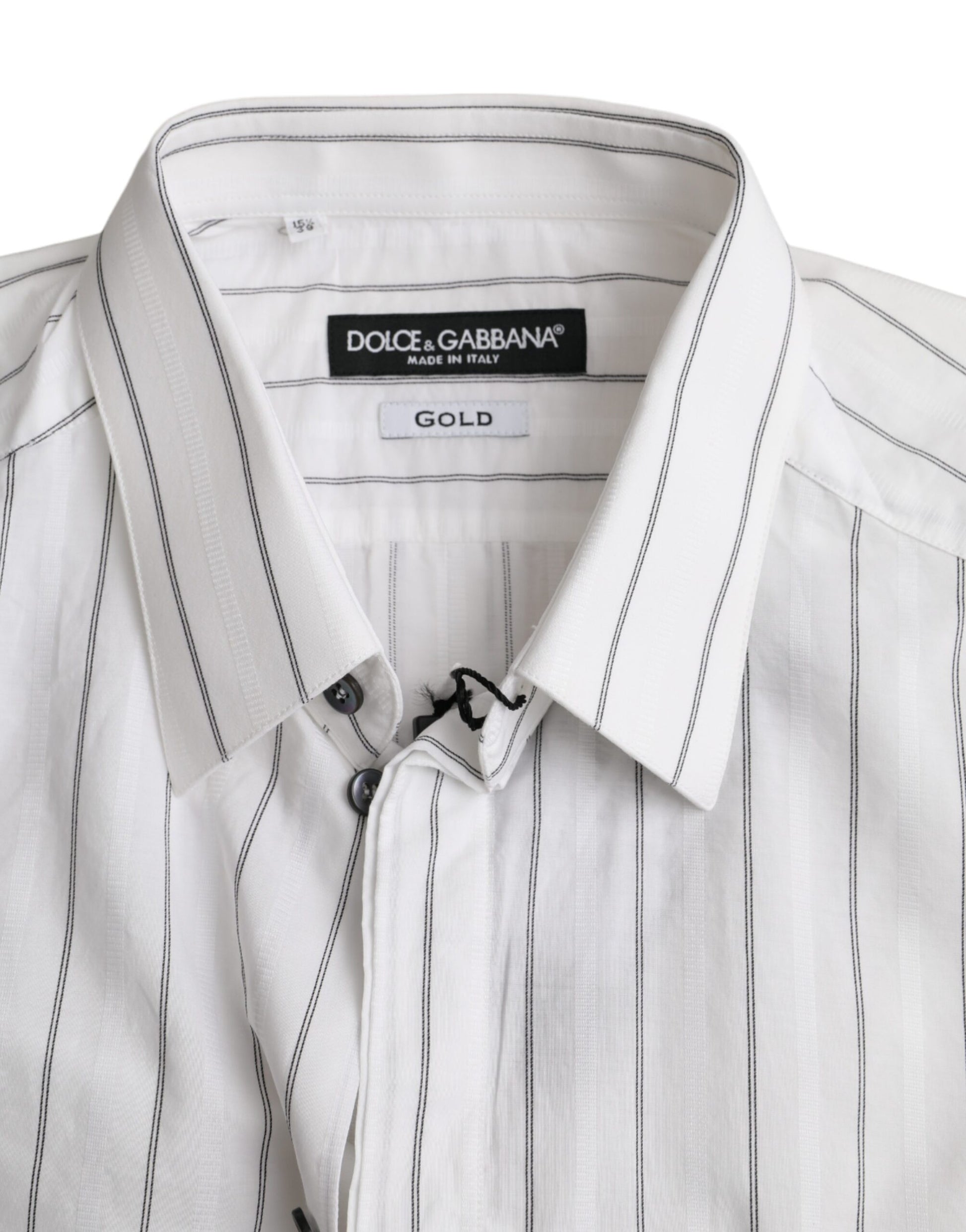 A black and white striped shirt with a gold label from Dolce & Gabbana