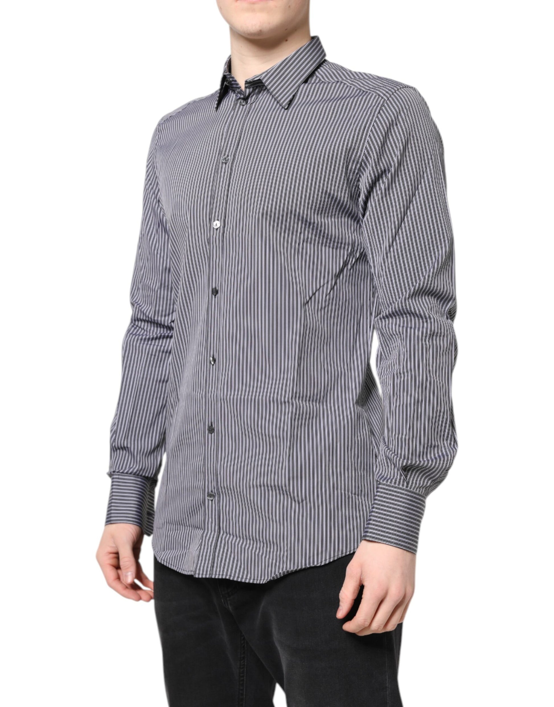 A black and white striped dress shirt with gold accents, designed by Dolce & Gabbana